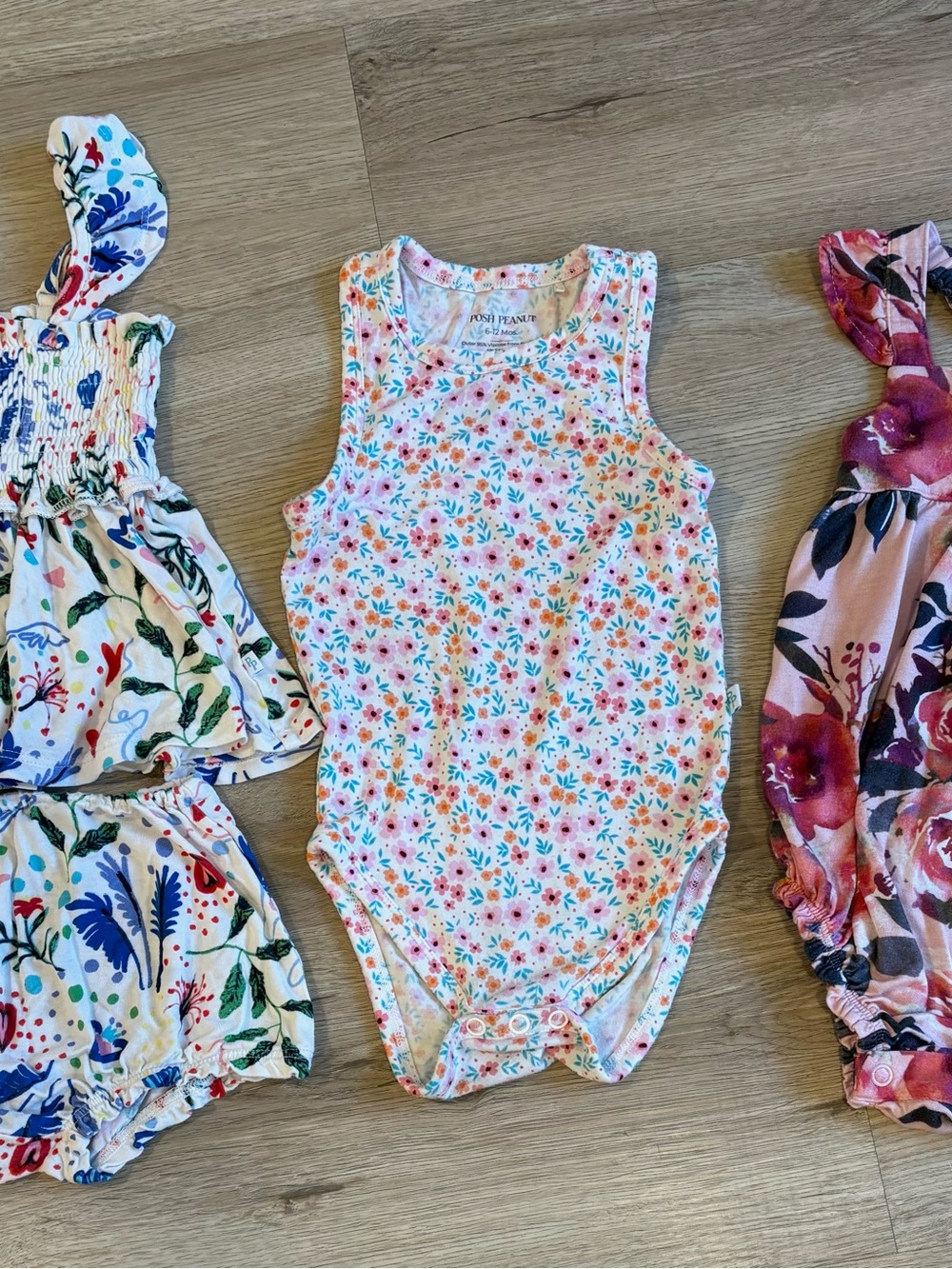 Posh Peanut White Floral Sleeveless Baby One-Piece with Pink & Blue Flowers